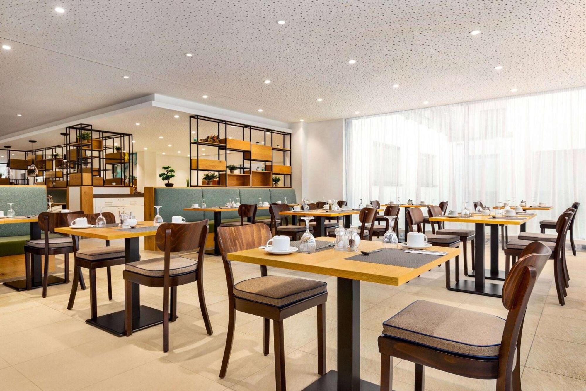 Wyndham Garden Munich Messe Otel Dış mekan fotoğraf Restaurant