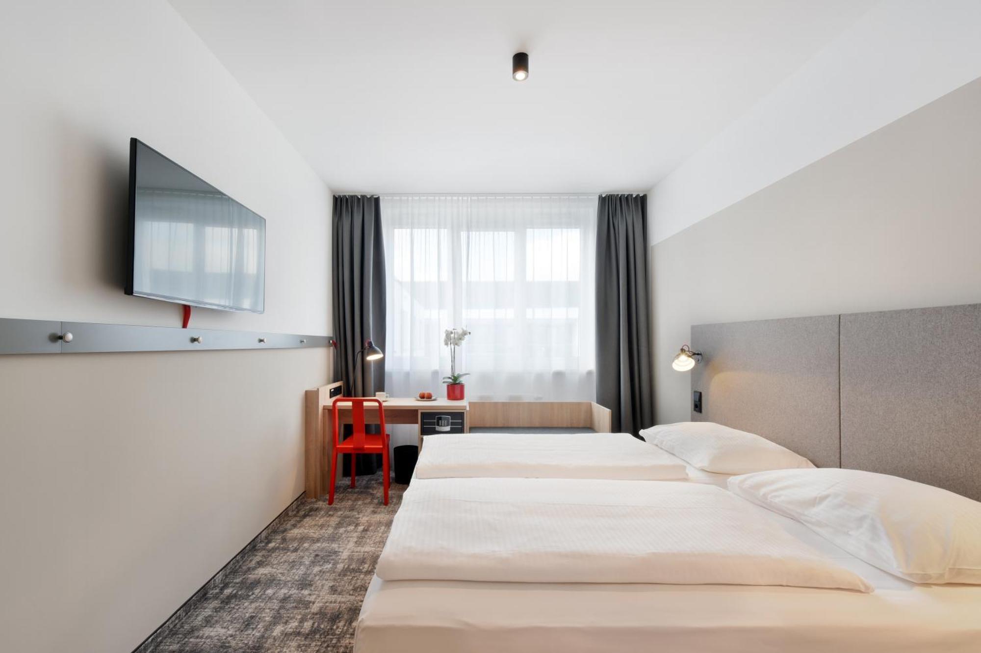 Wyndham Garden Munich Messe Otel Dış mekan fotoğraf Room of the hotel